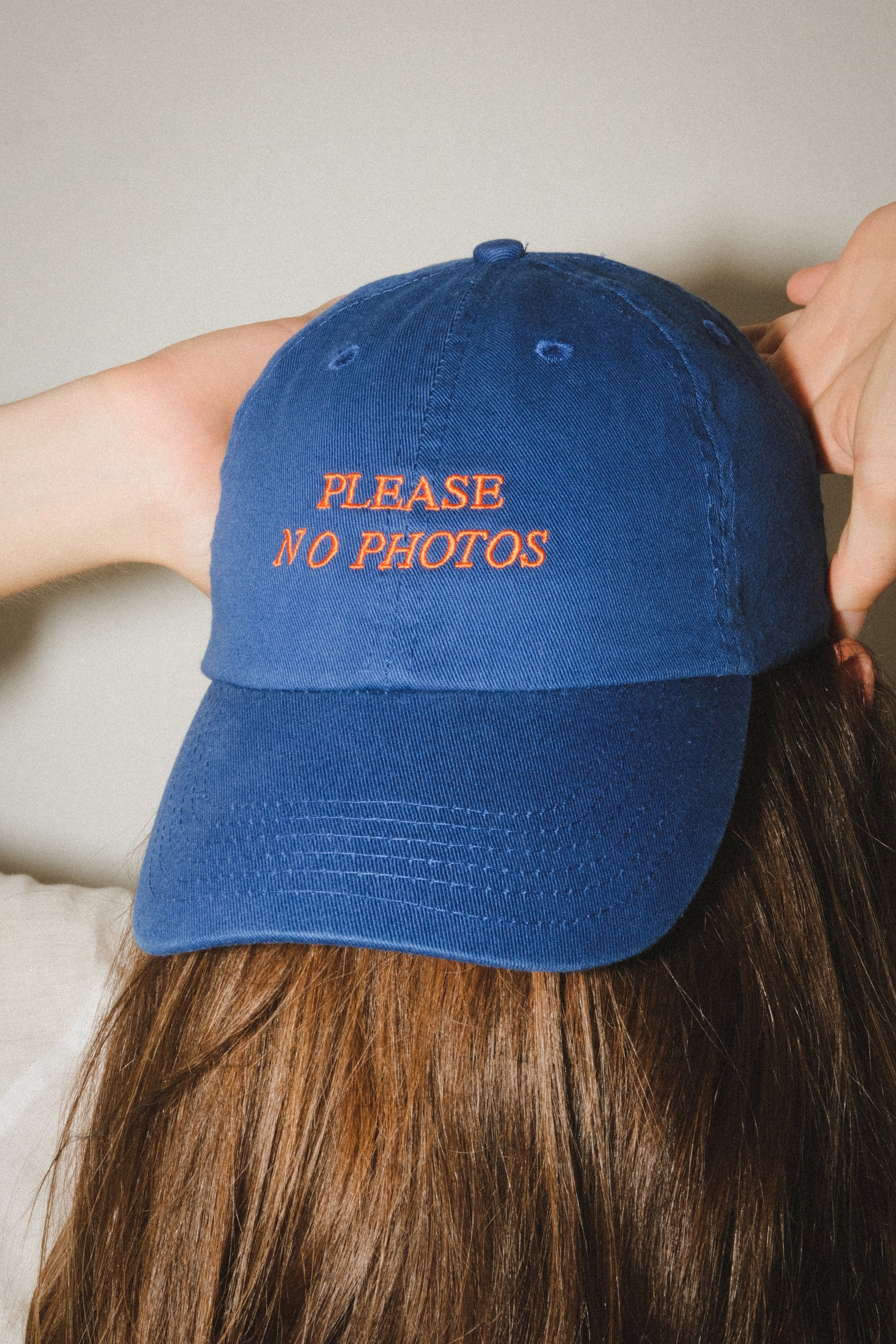 PLEASE NO PHOTOS CAP